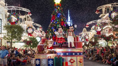 Mickey Mouse, Minnie Mouse and Duffy wave to Magic Kingdom guests as snow falls on Main Street, U.S.A., during " Mickey's Once Upon a Christmastime Parade" at Walt Disney World Resort. The festive processional is one of the happy highlights of Mickey's Very Merry Christmas Party, a night of holiday splendor with lively stage shows, a unique holiday parade, Holiday Wishes: Celebrate the Spirit of the Season nighttime fireworks, and snow flurries on Main Street, U.S.A. The special-ticket event takes place on select nights in November and December at Magic Kingdom in Lake Buena Vista, Fla. (Ryan Wendler, photographer)