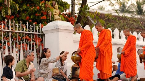 adventures-by-disney-asia-afica-and-australia-cambodia-vietnam-laos-hero-05-sunrise-alms-offerings